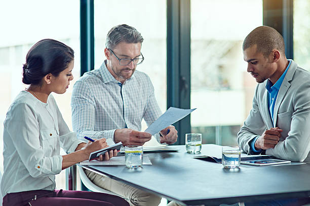 Shot of colleagues having a meeting in an office